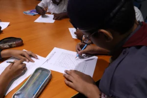 Participants playing a word search