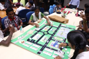 Participants place road signage on the road map